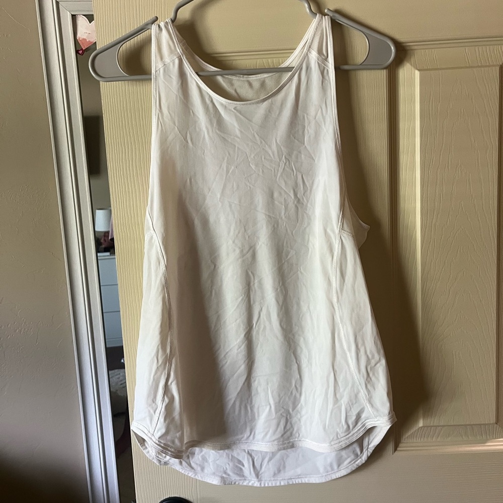 White lululemon tank top with mesh detail on the back! size 4